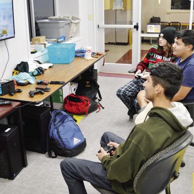 CDN | Michael Maresh Three Clinton High School students qualified for state recently in their esports division. From left, Demetrio Guzman, Noah Resendiz and Jackson McCullough practice their skills.