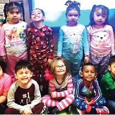 CDN | Courtesy Photo Reading celebrated with pajamas