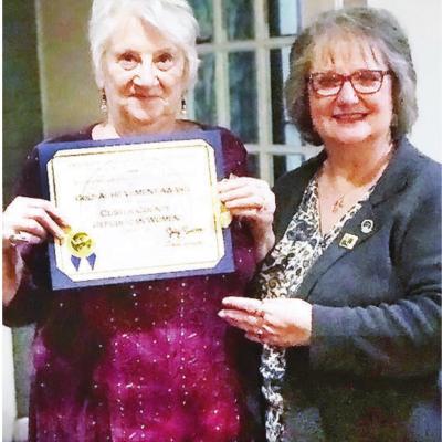 Melinda Dougherty, right, presents Rose Millspaugh with a Hold Reward for her work with the Custer County Republican Women. CDN |Courtesy Photo Millspaugh recognized