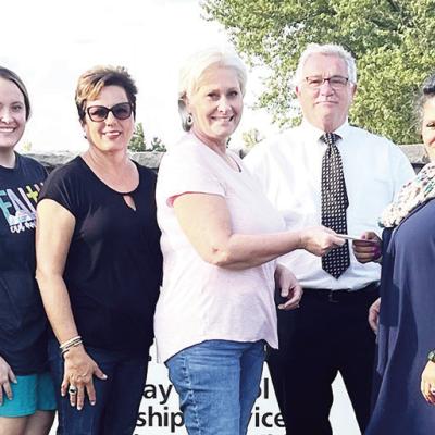 The Clinton Cumberland Presbyterian Church donated $500 to the Clinton Mission House from part of the proceeds collected from their salad luncheon. From left are Alice Evans, Natalie Vowell, Canda Dupree, Jennifer Vowell, Troy Lee, Mission House Director Mission House makes progress on renovations