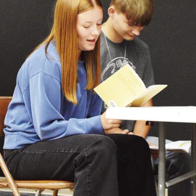 Bentli Whitson, left, and Will Kindsfather read through a scene together during a rehearsal for the Corn Bible Academy senior play. CDN | Micah Ashcraft Bentli Whitson, left, and Will Kindsfather read through a scene together during a rehearsal for the Corn Bible Academy senior play. CDN | Micah Ashcraft