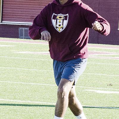 Ruben Labastida looks for a teammate during a recent Clinton soccer practice. CDN | Sam Goodwyn