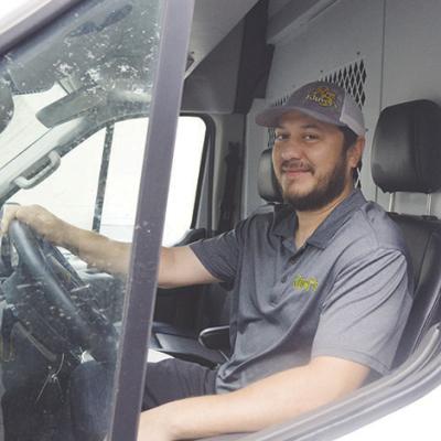 AJ Juarez ready to make his morning deliveries behind the wheel of the store delivery van just outside of Kluver’s Appliances &amp; Home Furnishings. CDN | Micah Ashcraft