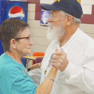 CDN | Emily Stephens Myrna and Mike Perkins participate in one of the dances at the weekly dance lessons. Free dancing lessons back in swing