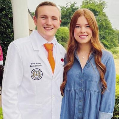 Atchley working through med school