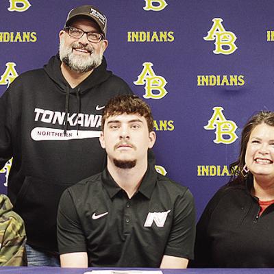 Arapaho-Butler’s Decker Davis, center, sits with his brother Slade, left, mom Diana, right, and dad Jake, standing, after he signs with Northern Oklahoma College to play baseball. CDN | Sam Goodwyn Arapaho-Butler’s Decker Davis, center, sits with his brother Slade, left, mom Diana, right, and dad Jake, standing, after he signs with Northern Oklahoma College to play baseball. CDN | Sam Goodwyn
