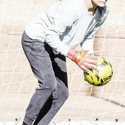 Isabella Mendoza secures the ball before it is able to get into the goal during practice. CDN | Sam Goodwyn