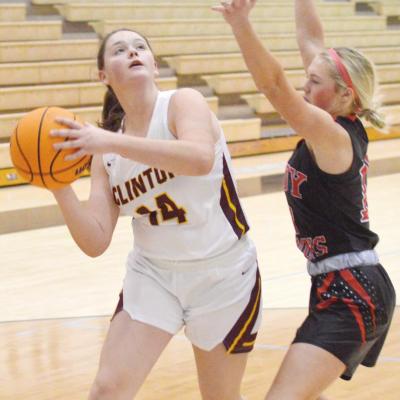 Lady Reds shine in clutch, advance