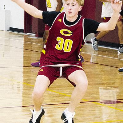 Axl Deatherage works on his defensive skills during basketball practice Wednesday in the practice gym. CDN | Sam Goodwyn