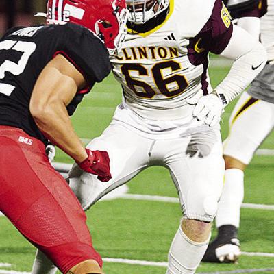 No. 66 Marcus Wilson focuses on the Elgin defender as he prepares to block during Clinton’s game against the Owls this season in Elgin. CDN | John Kinsey Senior looks to join medical field after college