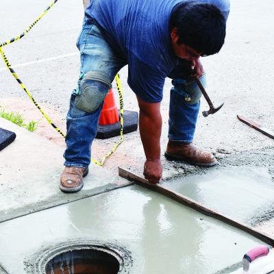 Touching up the sidewalk