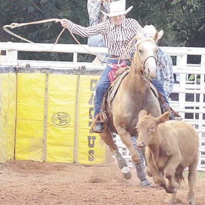 El Reno’s Rachel Ellis blasts out the gate in last year’s rodeo as she participates in the breakaway roping event at the Clinton Rodeo Arena. CDN | Sam Goodwyn