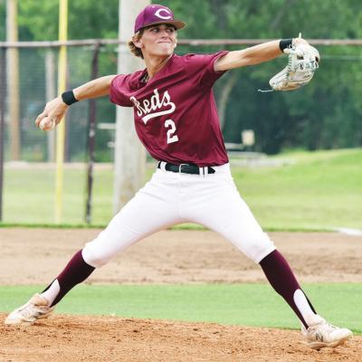 Kaison Louthan pitches for the Reds Tuesday against Elk City. CDN | Josh Jennings Clinton baseball loses at home against Elk