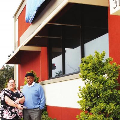 Christina Perrine, left, an interior designer under contract with DVA, and retired Colonel Wilson Guilbeaux Jr., Cognition, LLC president and CEO, stand in front of Clinton’s VA satellite clinic. CDN | Staff Photo Veterans clinic: ‘Still some important work to be done’