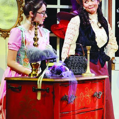 Hannah Gregory, left, portrays Minnie alongside Blair Barnett as the titular Dolly in Southwest Playhouse’s production of “Hello, Dolly!” CDN | Hope King Hannah Gregory, left, portrays Minnie alongside Blair Barnett as the titular Dolly in Southwest Playhouse’s production of “Hello, Dolly!” CDN | Hope King