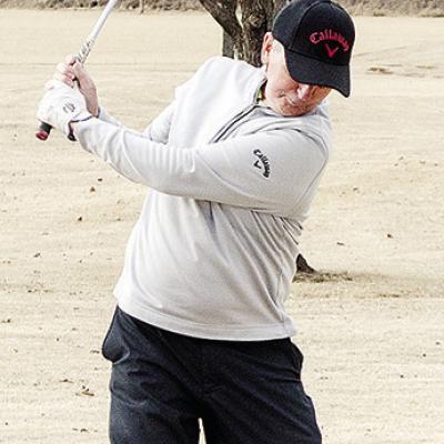 Bob Jacobson takes a swing during a round of golf Wednesday at Riverside Golf Course. CDN | Sam Goodwyn