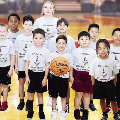 The Clinton Elementary Boys’ Gray basketball team smiles for its team photo. Pictured, from left, in front are Courage Fletcher-Whiteman, Thiago Coutino, Jesus Martinez and Lejend James; middle, Brodie Gibson, Gianlucca Coutino, Kayden Ashcraft, Giancar