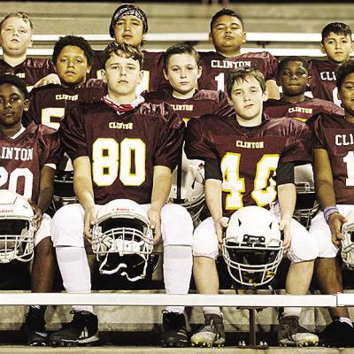 The Maroon Team is focused as it takes a team photo prior to winning the inaugural Bryant Calip Championship game. Pictured in front, from left, are Keaston Fieselman, Cordae James, Jance Baker, Lyrik Hunter, Tru Randle, and Malachi Ford; middle row, Luka
