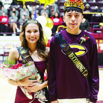 Seniors Lillian Lime, left, and Rufus Whiteman-Ellis were crowned Homecoming Queen and King prior to Clinton’s basketball games Tuesday against Cache in the Tornado Dome. CDN | Sam Goodwyn