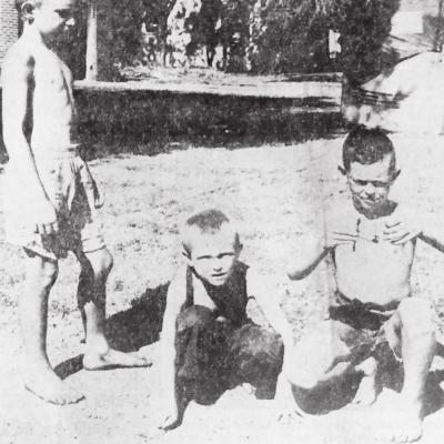 60 YEARS AGO Johnny Steffes, left, watches his brother, Gary Steffes, center, demonstrate the correct way to light a firecracker, while Charles Ladd right, shows the incorrect way. Gary places his firecracker on the ground and lights it from a safe distan CLINTON’S HISTORY 10, 20 AND 30 YEARS AGO