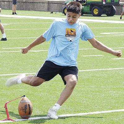 Clinton’s Ruben Martinez practices kicking field goals during practice Monday in the Tornado Bowl. CDN | Sam Goodwyn