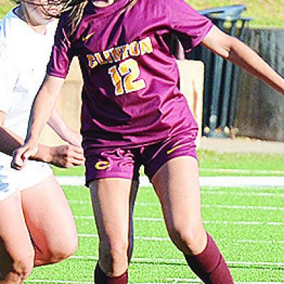 No. 12 Maddi McAtee outraces a Newcastle defender to the ball during Clinton’s win over the Lady Racers. CDN | Sam Goodwyn