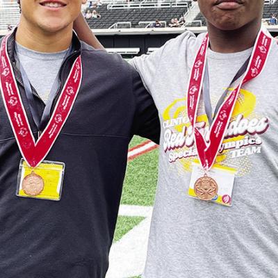 Clinton’s Sutton Hernandez, left, and Bryson Miles are all smiles after winning bronze in the Unified Boccee Ball event during the State Special Olympics at Oklahoma State. CDN |Courtesy Photo Clinton’s Sutton Hernandez, left, and Bryson Miles are all smiles after winning bronze in the Unified Boccee Ball event during the State Special Olympics at Oklahoma State. CDN |Courtesy Photo