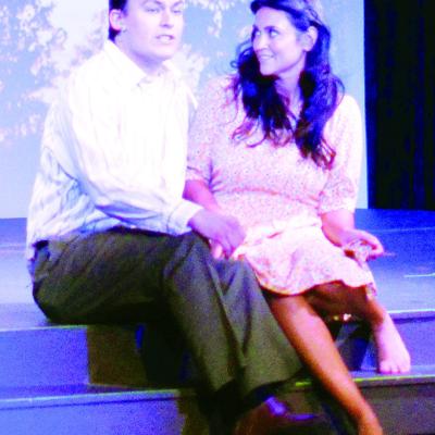 Wesley Javorsky, left, as Jimmy Ray and Blair Barnett Green as Alice Murphy perform together during the Southwest Playhouse’s production of “Bright Star” Wednesday evening. CDN | Micah Ashcraft