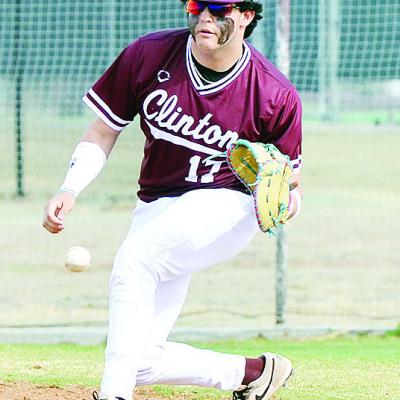 Clinton’s Kadon Rivera focuses on the ball as he prepares to catch it during the Reds’ game against Leedey. CDN | Sam Goodwyn Clinton’s Kadon Rivera focuses on the ball as he prepares to catch it during the Reds’ game against Leedey. CDN | Sam Goodwyn