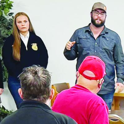 Annabelle Rose, left, and Arapaho-Butler Ag Teacher Mitchell Hunter give a presentation to a group of locals with questions ahead of the Sept. 9 bond issue vote for a new Ag building. CDN | Courtesy photo