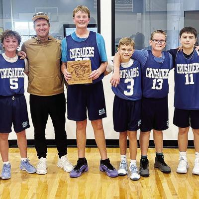 Corn Bible Academy’s seventh- and ninth-grade boys’ basketball is all smiles after finishing third at the Olustee Basketball Tournament. Pictured, from left, are Lawson Roberson, Graham Murray, Matt Murray, Nathan Cooke, Caleb Clabaugh, Ethan Cooke, B