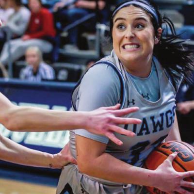 Karly Gore drives to the basket during SWOSU’s 90-58 home victory Tuesday over rival Northwestern Oklahoma State. Gore tallied five points, six rebounds, five assists and two steals. CDN | Courtesy photo Lady Bulldogs dominate Northwestern, 92-58