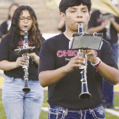 Clinton High School band students Diana Mejia, left, and Miguel Galvan play tunes from the hit musical “Chicago” at the first home football game. CDN | Emily Stephens Clinton band set for contest