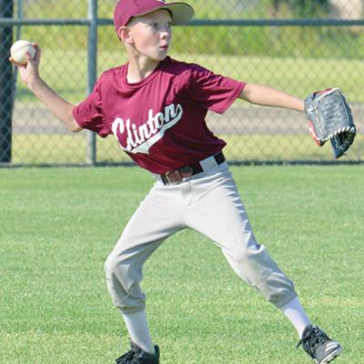 Kaisan Thompson of the Clinton Maroons throws the ball to the infield. CDN | Josh Jennings Clinton Maroons come up short