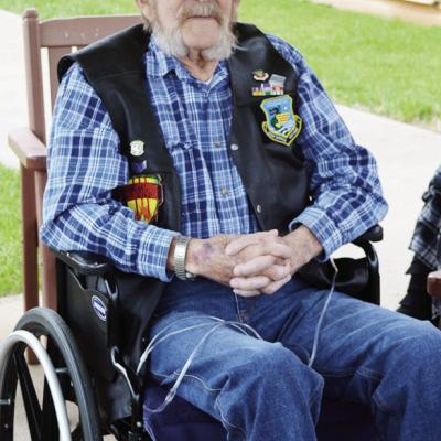 Decorated veteran Staff Sgt. Jack Myers sits outside and enjoys the weather Thursday at the Clinton Veterans Center. CDN | Christian Jacobsen