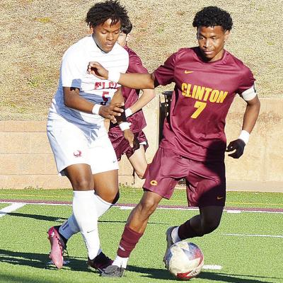 Clinton’s No. 7 Deontray Beavers battles with an Elgin defender during the Red Tornadoes’ home win over the Owls in the Tornado Bowl. CDN | Sam Goodwyn Clinton’s No. 7 Deontray Beavers battles with an Elgin defender during the Red Tornadoes’ home win over the Owls in the Tornado Bowl. CDN | Sam Goodwyn