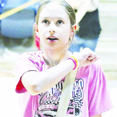 Nevaeh Foster practices dance moves while learning the choreography for the Southwest Playhouse summer production of the musical “Newsies.” CDN | Elisha Rangel Rehearsing choreography