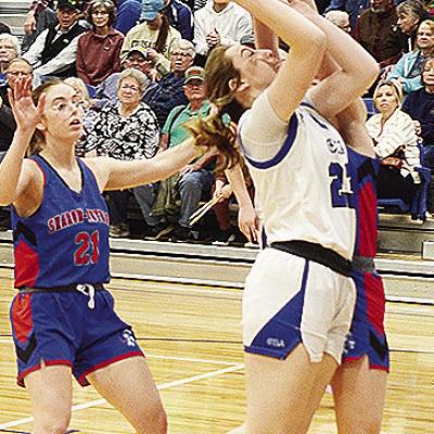 Corn Bible Academy’s Olivia Webb attempts a layup during the Lady Crusaders’ home win over the Sharon-Mutual Lady Trojans last week. CDN | Sam Goodwyn Corn Bible Academy’s Olivia Webb attempts a layup during the Lady Crusaders’ home win over the Sharon-Mutual Lady Trojans last week. CDN | Sam Goodwyn