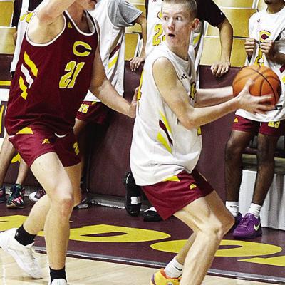 Clinton’s Ayden Crumley, left, defends against Ryder Adams during a Reds’ practice in the Tornado Dome. CDN | Sam Goodwyn Clinton’s Ayden Crumley, left, defends against Ryder Adams during a Reds’ practice in the Tornado Dome. CDN | Sam Goodwyn