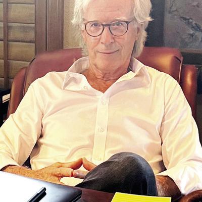 Mart Tisdal takes a break at his desk between clients at Tisdal and O’Hara. Tisdal honored as Lawyer of the Year