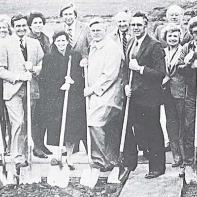 Local and visiting dignitaries lined up to turn the symbolic first shovels of dirt for the new Citizens National Bank building to be built at Modelle Ave. and 28th Street. Manning shovels, from left, Olen Treadway of Chickasha, a director of the new bank; Ron Leavell, bank president and director; J.E. Epperson, Chickasha, director; Lyne Schoeck of the Bunce Corp., St. Louis, Mo., project mananger for construction; Clinton Mayor Charles Goodwin, co-developer of the Wheatland Plaza shopping center where the bank was located; Jesse Glen Stratton Jr., director; Ron Sewell, director; and Calvin Browning, director and co-developer with Goodwin of the shopping center. Back row, left to right, were Wilbur Leavell, Clinton Chamber of Commerce member; Freda Kirkpatrick, chamber executive director; Kay Smith, chamber -director; Elmer Smith, chairman of the board of the new bank; Gary Farri of the Bunce Corp.; City Manager James Luckett, standing behind Canda Sewell; and Teresa Kerby, chairman of the chamber’s Brite Lite 40 YEARS AGO