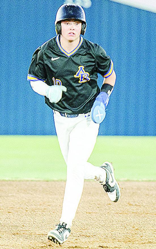 Arapaho-Butler’s Jack Goldsberry sprints to third base during the Indians’ win Thursday over Fletcher at home. CDN | Sam Goodwyn Arapaho-Butler’s Jack Goldsberry sprints to third base during the Indians’ win Thursday over Fletcher at home. CDN | Sam Goodwyn