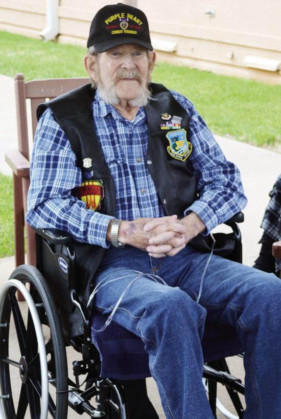 Decorated veteran Staff Sgt. Jack Myers sits outside and enjoys the weather Thursday at the Clinton Veterans Center. CDN | Christian Jacobsen